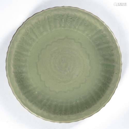 Celadon Longquan charger Chinese , Ming (1368-1644) heavily potted and of foliate form, with incised