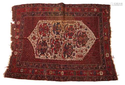 Afshar red ground rug with central ivory ground panel and geometric and foliate border, 154cm x