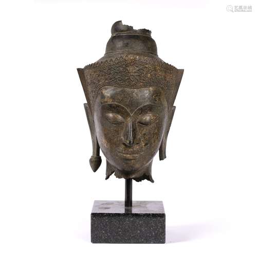 Gilded metal model of a head Chinese cast with a decorative crown, with remnants of gold gilding,