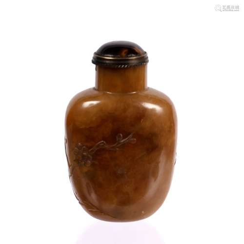 Amber jade snuff bottle Chinese, 18th Century with carved prunus branch and tortoiseshell stopper,
