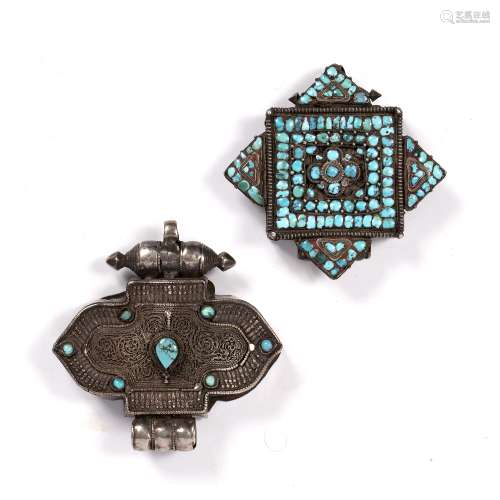 Two gau amulets Tibetan both with inset turquoise stones, 9cm, 10cm across (2)