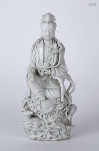 Blanc de chine model of Guanyin Chinese, 19th/20th Century the seated figure holding a lotus
