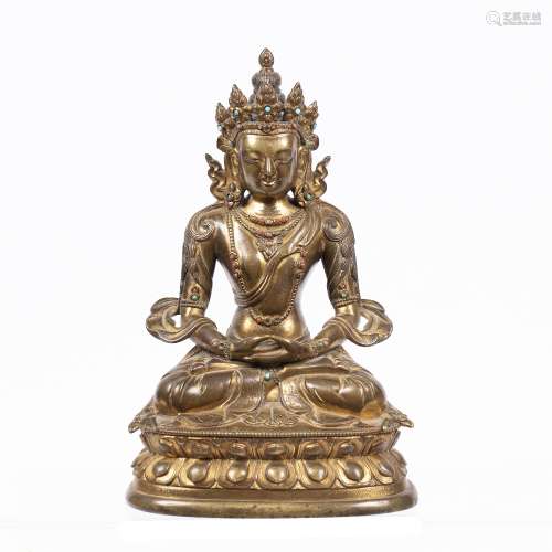 Gilt bronze figure of a crowned Manjusri Tibetan, 18th Century the figure seated Dhyana style upon a