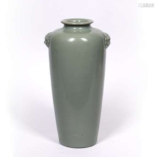Celadon Longquan vase Chinese, late Ming (1368-1644) of tapering form with mask head mounts to the