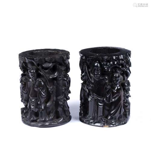 Pair of relief carved brush pots Chinese, 19th Century in black stained hardwood, 20.5cm high