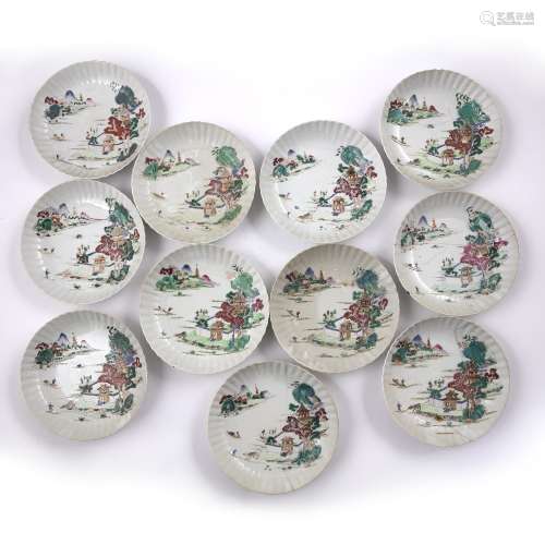 Set of eleven famille rose dishes Chinese, 19th Century each of fluted form painted with a river