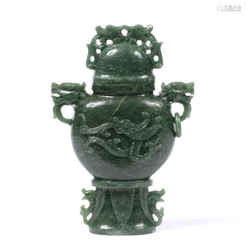 Mottled green jade vase and cover Chinese carved to the body with a dragon blowing flames, the sides