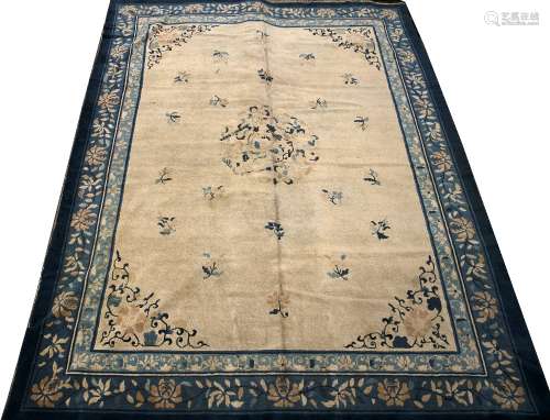 Peking carpet Chinese, circa 1920 ivory ground with stylised blue foliate motifs, 340cm x 270 cm