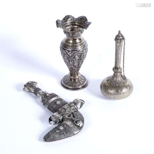 Three items of white metal Indian to include a posy vase, engraved with figures to the body, 15.