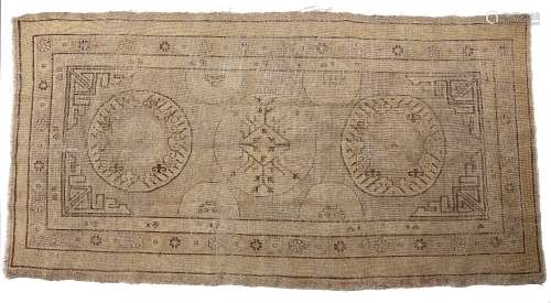 Khotan rug Chinese with stylised circular medallions, 254cm x 122cm