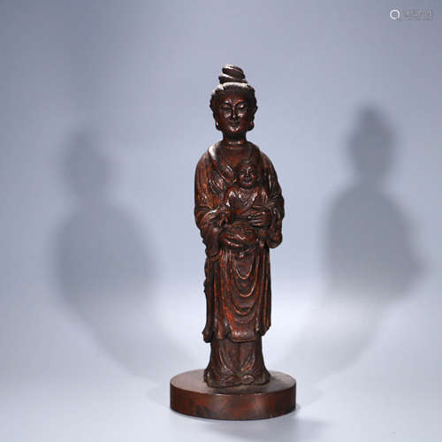 A Chinese Bamboo Carved Songzi Guanyin Statue