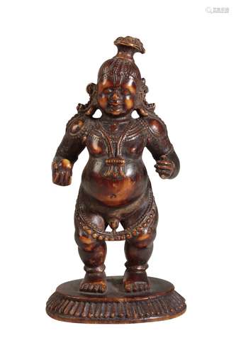 RARE INDIAN CARVED IVORY FIGURE OF A YOUNG KRISHNA, 16TH / 17TH CENTURY