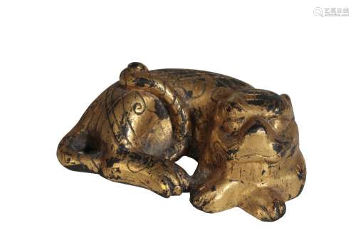 GILT-BRONZE LION SCROLL WEIGHT, MING OR LATER
