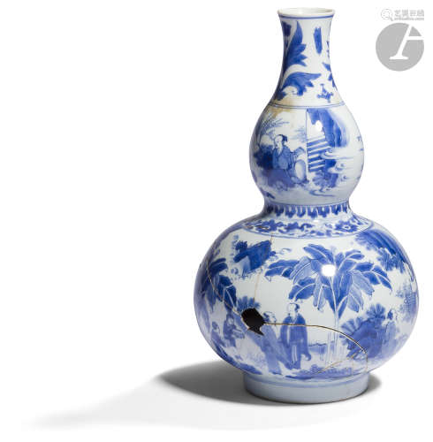 CHINE - XVIIe siècle Vase double gourde en porcelaine émaillée en bleu sous couverte de lettrés