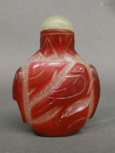 CHINA Snuffbox bottle made of red hard stone. H. : 8 cm