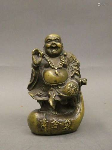 CHINA Bronze depicting a sitting laughing Buddha. Late 19th century H. : 13cm