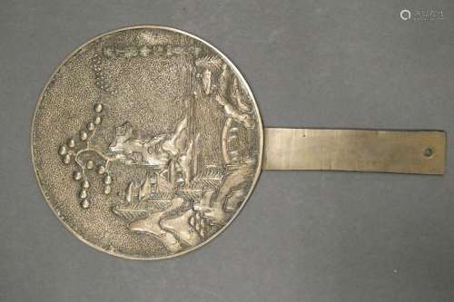 JAPAN Circular bronze mirror with its handle decorated on one side with a mountain lake landscape with pagodas, bridge, pine. Bearing an eight-character inscription MEIJI period