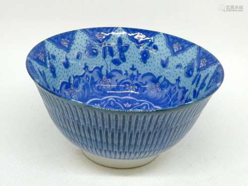 CHINA Blue porcelain bowl decorated with floral motifs. Marked on the reverse side. Ht: 7cm - Diam: 13cm