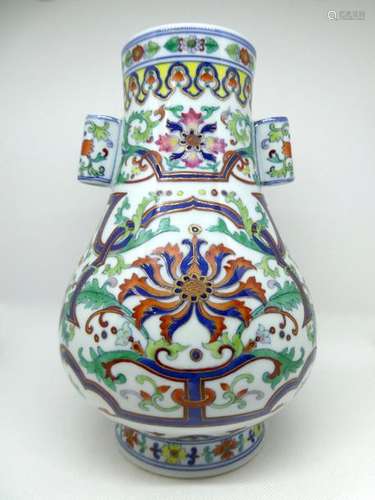 CHINA Polychrome porcelain vase with flower decoration H. 26 cm