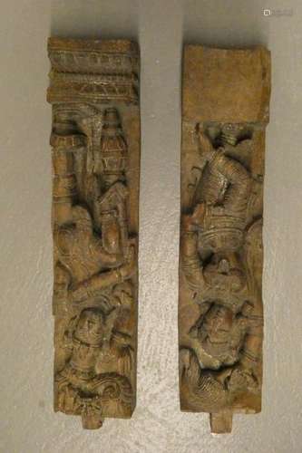 INDIA Two carved wooden elements representing deities. H : 71 cm