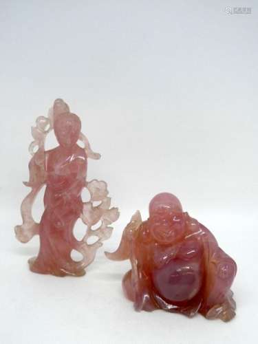 CHINA Set of two rose quartz subjects, one representing a seated Buddha, the other a lady of the court. H. : 10 and 16cm