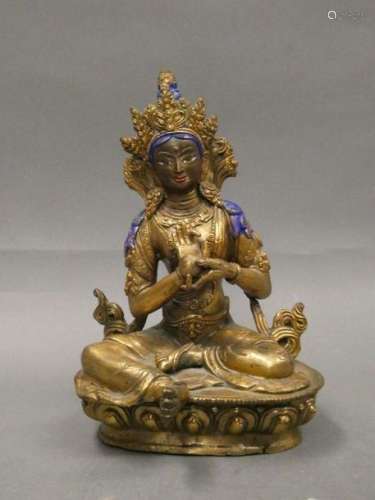 Southeast Asia Divinity in gilt bronze and color highlights. Size : 20,5 x 12, 3 x 10,5 cm