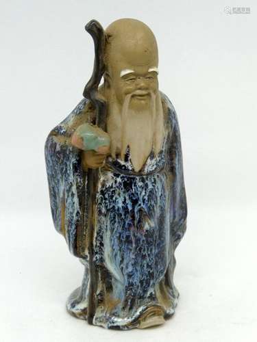 CHINA Glazed terracotta subject showing a wise man standing holding a cane. Ht : 20cm