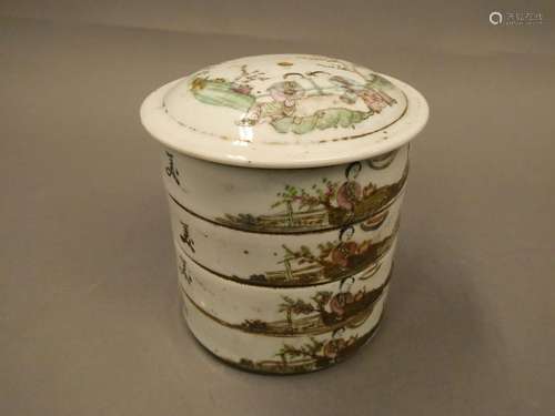 CHINA White porcelain box with four compartments decorated with characters. Pierced on the top. Ht.: 12cm - Diam.: 11,5cm