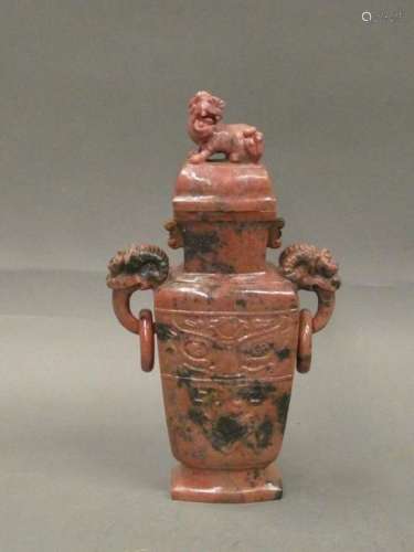 CHINA Archaic style covered vase made of carved hard stone. twentieth century Size: 24 cm