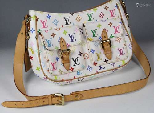 VUITTON Sac monogrammé couleur, cuir et toile endu…