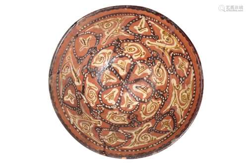 ISLAMIC BROWN-GLAZED POTTERY BOWL, 12TH CENTURY