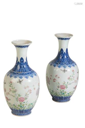 PAIR OF BLUE AND WHITE FAMILE ROSE VASES