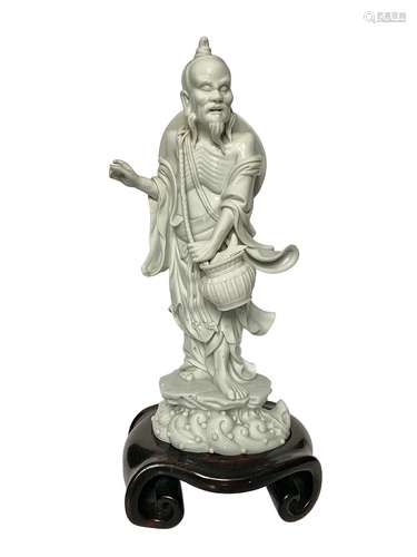 BLANC-DE-CHINE FIGURE OF A LOHAN, QING DYNASTY 18TH / 19TH CENTURY