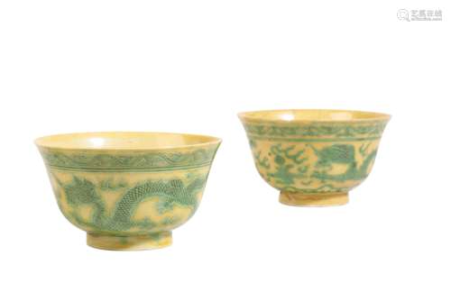 TWO YELLOW AND GREEN ENAMELLED 'DRAGON' BOWLS, KANGXI SIX CHARACTER MARKS BUT 19TH CENTURY