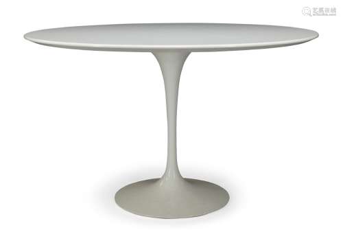 After Eero Saarinen (1910-1961), a 'Tulip' dining table, produced by Knoll, c.1990, with applied