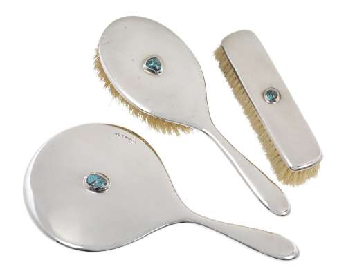 Liberty & Co, a silver dressing table set with turquoise matrix cabochons Mark of Liberty & Co,