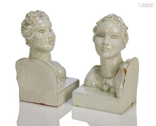 A pair of glazed terracotta bookends, possibly Austrian and in the style of the Wiener Werkstatte