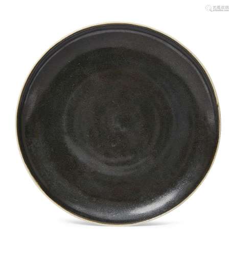 Lucie Rie (1902-1995) and Hans Coper (1920-1981), a manganese glazed plate c. 1960, both seals