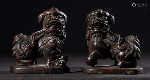 PAIR OF HUALI WOOD ORNAMENT SHAPED WITH LION