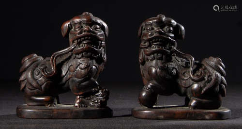 PAIR OF HUALI WOOD ORNAMENT SHAPED WITH LION
