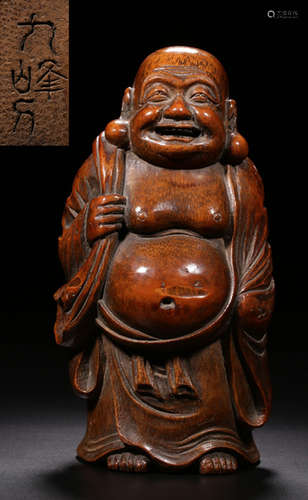 A BAMBOO BUDDHA STATUE