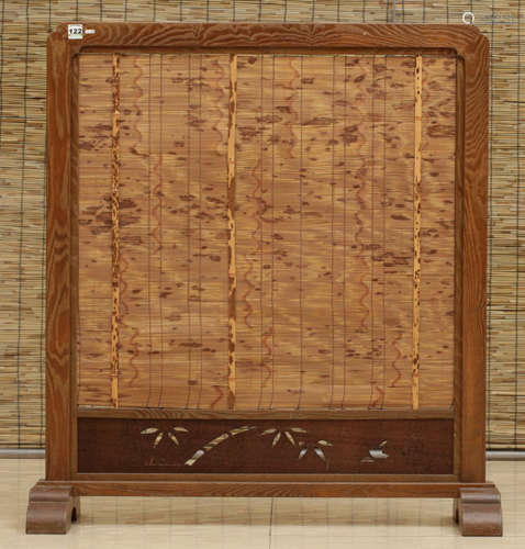 A BAMBOO SCREEN WITH NATURE PATTERN
