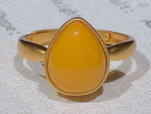 A BEESWAX RING SHAPED WITH HEART