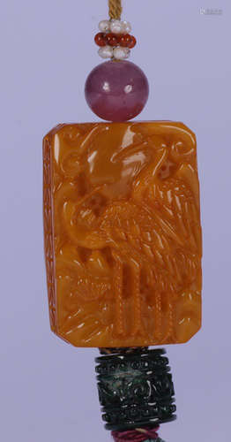 A BEESWAX TABLET CARVED WITH CRANE