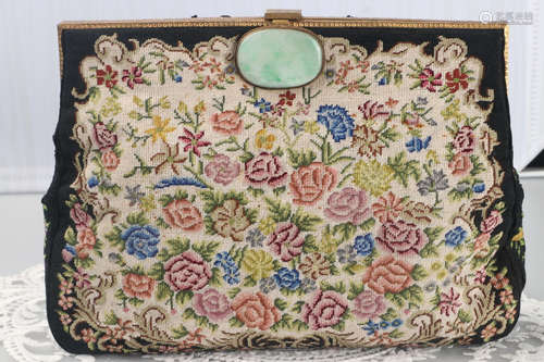 A FLOWER PATTERN BAG EMBEDDED WITH JADEITE