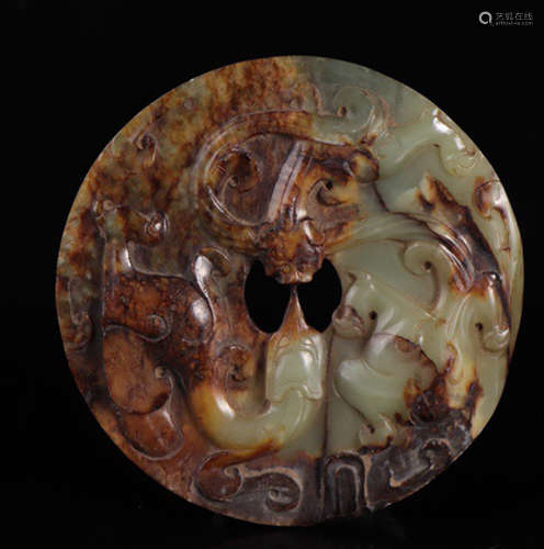 A HETIAN JADE BI CARVED WITH BEAST