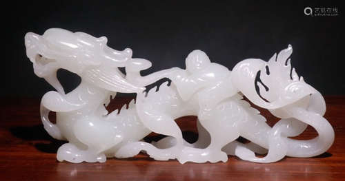 A HETIAN JADE DRAGON PENDANT