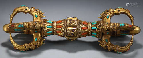 A GILT BRONZE VAJRA EMBEDDED WITH GEM