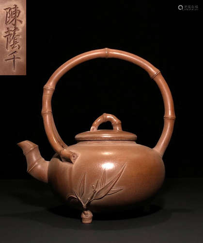 A ZISHA TEA POT CARVED WITH POETRY