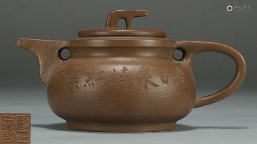 A ZISHA TEA POT CARVED WITH POETRY